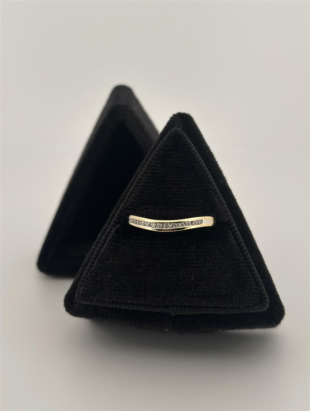 Yellow Gold Diamond Channel Set Curved Band