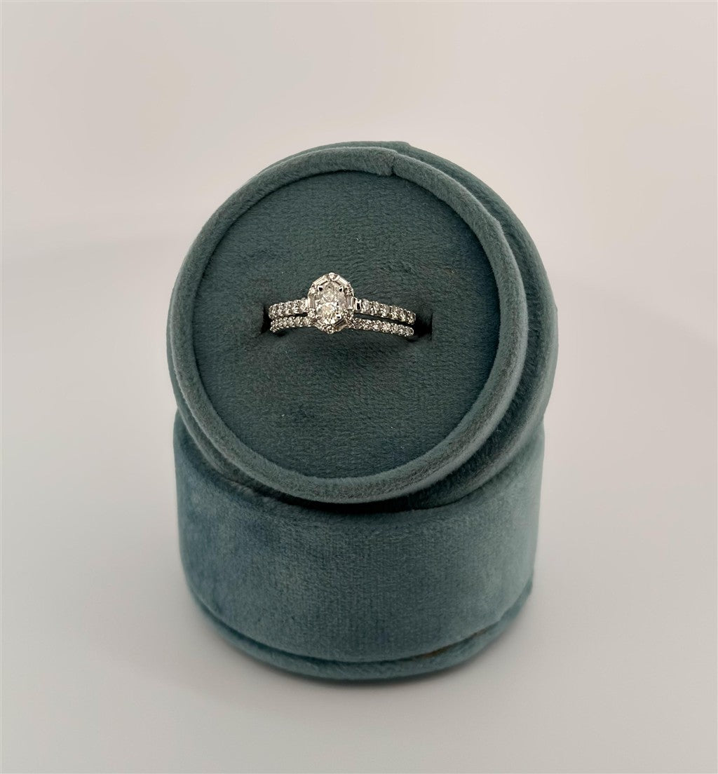 White Gold Oval With Baguette Halo Bridal Set