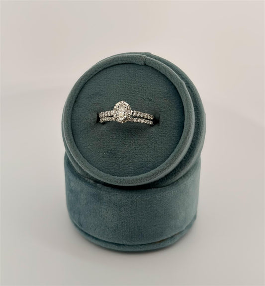 White Gold Oval With Baguette Halo Bridal Set