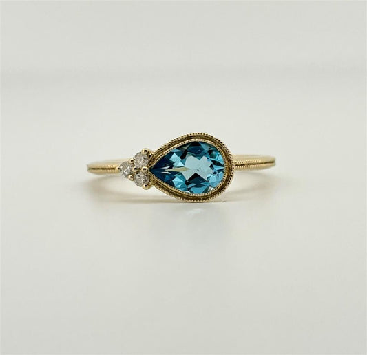 Yellow Gold Diamond Accented Blue Topaz Ring