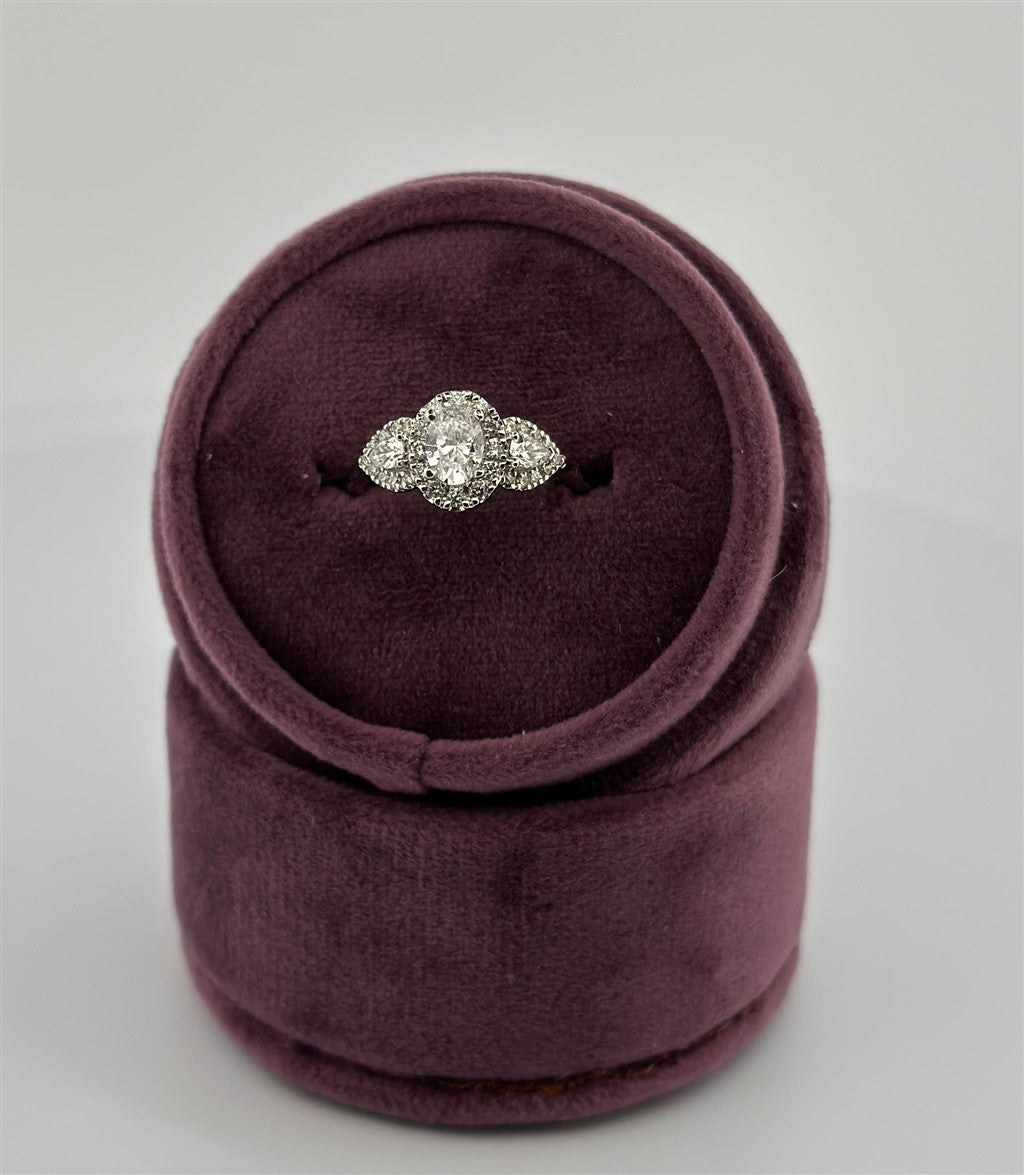 White Gold Halo Style Three Stone Engagement Ring